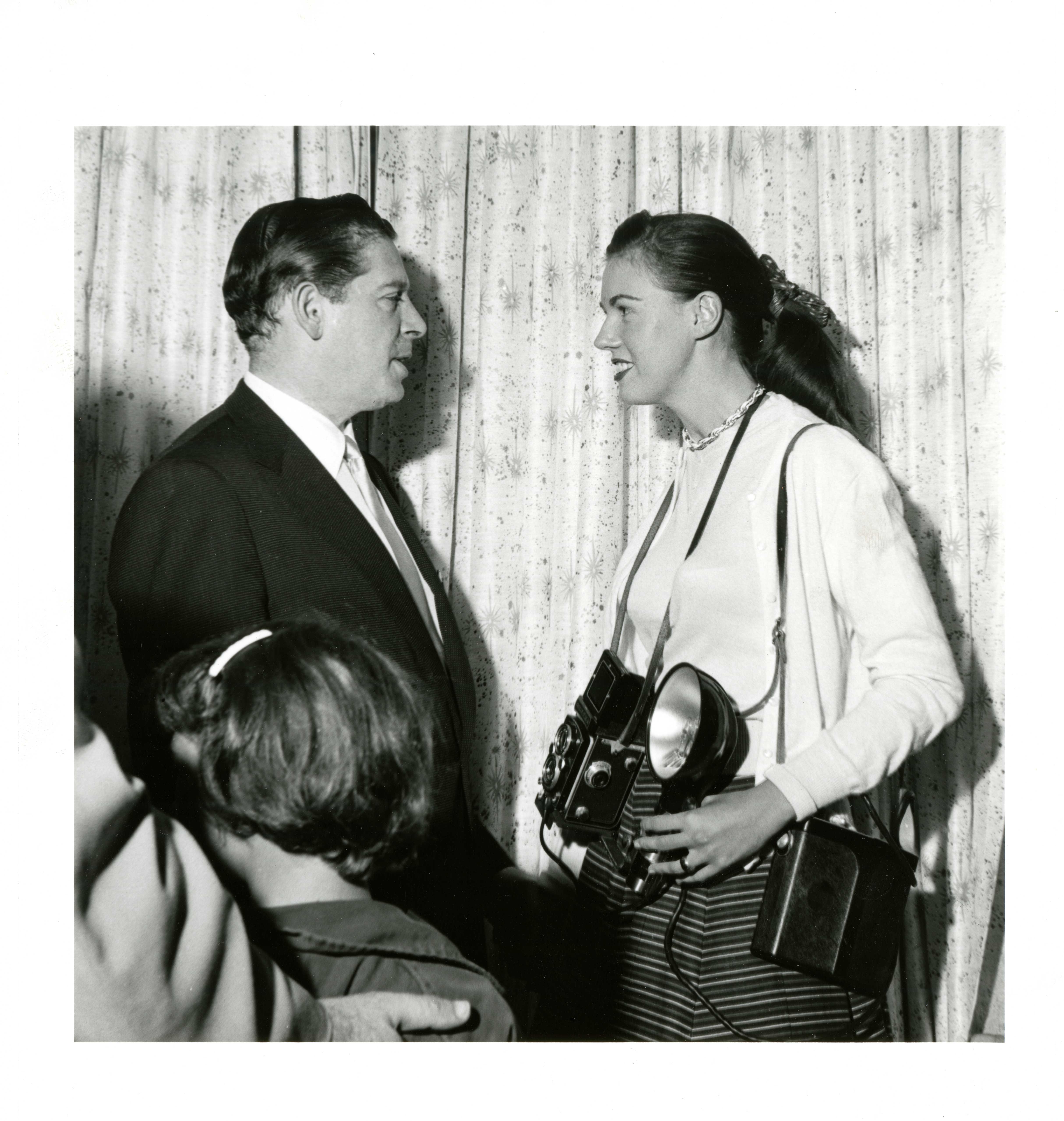 Milton Berle (left) and Bunny Yeager (right)